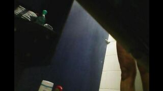 A girl has no shame and caresses her shaved pussy in the shower