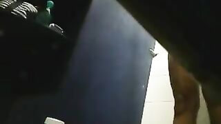 A girl has no shame and caresses her shaved pussy in the shower