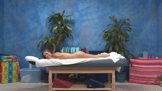 A massage therapist relaxes a young girl with erotic touches