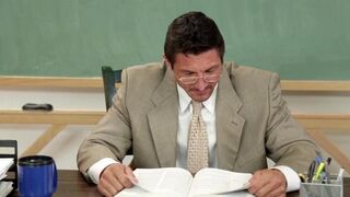 A student girl gets a good mark thanks to the teacher’s exciting lesson