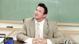 A student girl gets a good mark thanks to the teacher’s exciting lesson