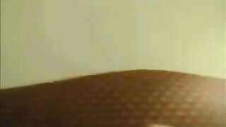 Latina with big tits gets naked in front of the camera