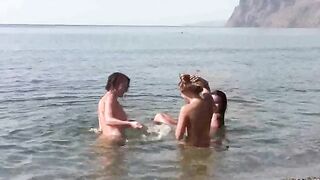 A group of nudists enjoy a day on the barefoot beach