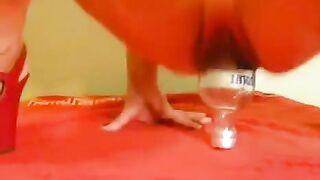 Fisting with a large dildo and a bottle, just great!