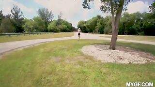 A young couple are having fun on the city park