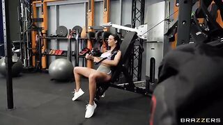 A woman is having fun with another girl in the gym