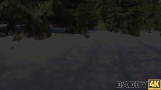 A hot woman has sex while her man pulls the sled by the fireplace