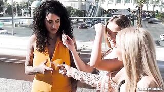 Two sexy chicks are playing cards naked and then they have sex