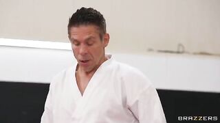 A girl gets fucked in an uncomfortable position by a trainer