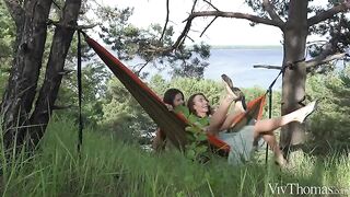 A girl gets a tan in the crotch from her girlfriend’s nipples
