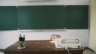 The girl is enjoying learning and following the teacher's instructions