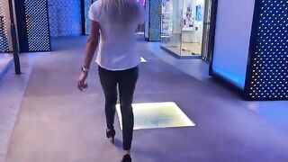 The girl is ready to do everything to conclude the deal in the mall