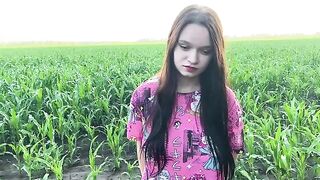 A hot girl is having fun with her stepbrother in the cornfield