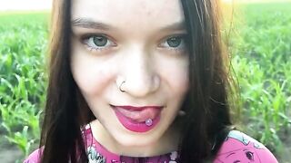 A hot girl is having fun with her stepbrother in the cornfield