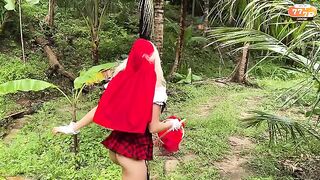 A little girl in a red riding hood costume knows what she wants