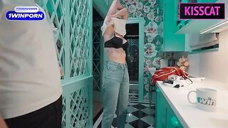 A pretty lady is serving a man and brings him something special