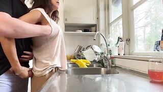 A couple has sex right in the kitchen, with intense passion