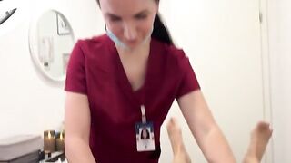 A hot nurse smooths out a client's intimate area with wax