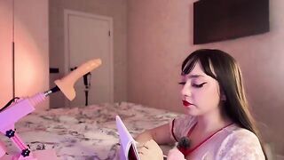 A nurse is checking the girl’s body using a special device