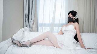 An Asian woman in a wedding dress has sex with her ex
