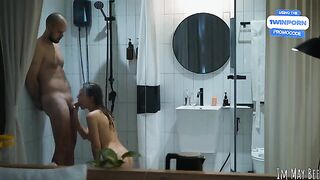 A couple enjoys a passionate shower session with intense action