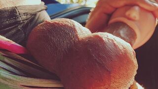 A girl with a silicone mouth works outdoors and gets cum in her mouth