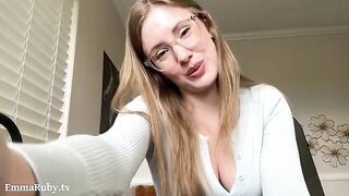 A girl with glasses, Emma Ruby, wearing sexy lipstick, caresses you