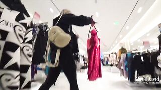 A sexy girl was almost caught while giving a blowjob in the fitting room