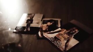 Two girls and a guy in a dark, passionate threesome scene
