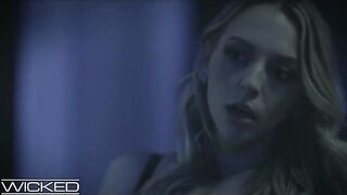 Two girls and a guy in a dark, passionate threesome scene